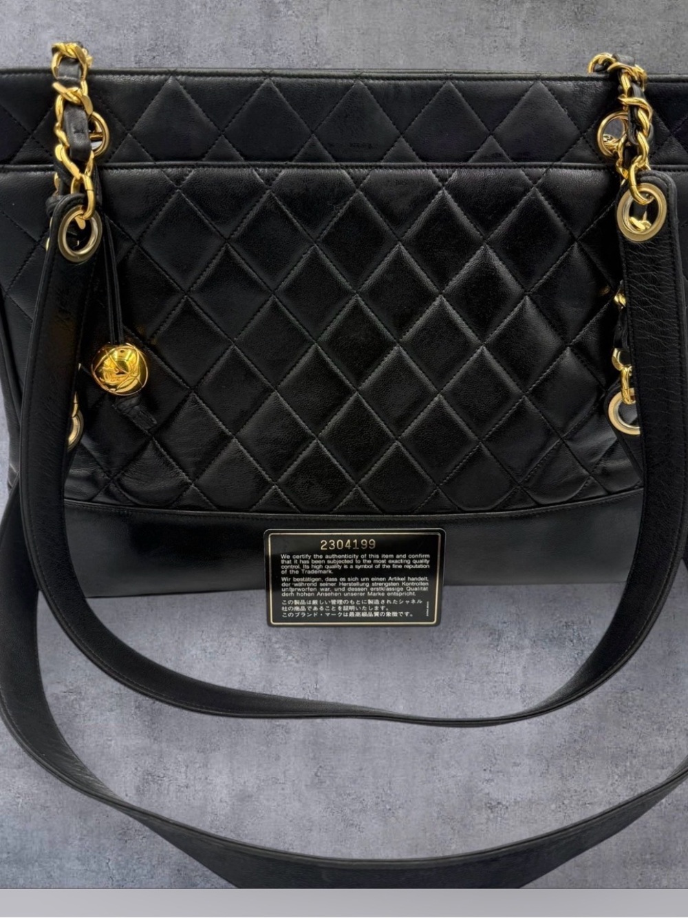 Black Quilted Chanel Shoulder Bag with Gold Hardware